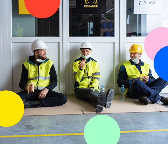 # warehouse workers sitting eating together