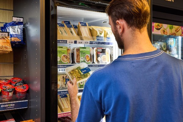 Man selecting a meal at Micro Market